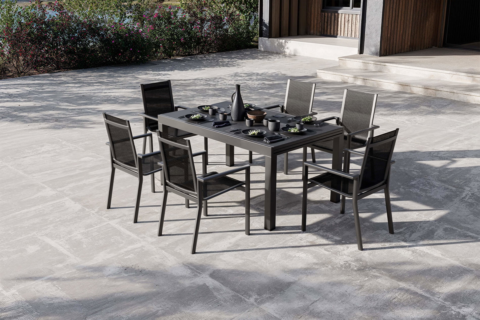 OUTFLEXX Premium Garten-Essgruppe, anthrazit matt/schwarz, Alu/Spraystone/Textilene, Tisch 160/260 x 100 cm, ausziehbar, 6 Stapelsessel
